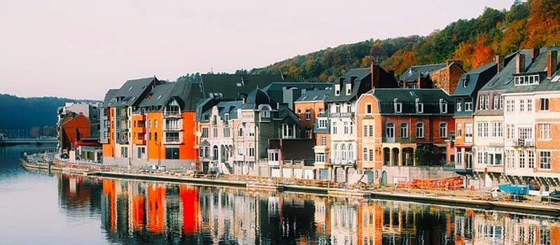 A view of houses on the riverbank in Dinant, Belgium.