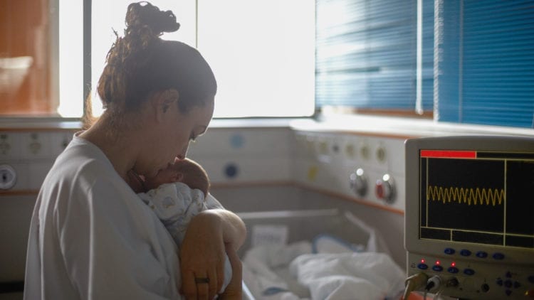 Mother and newborn in hospital setting