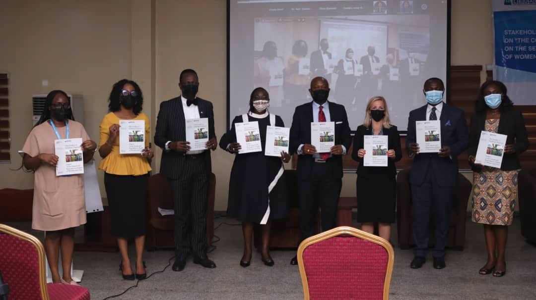 Stakeholders at a Nigeria event holding reports.