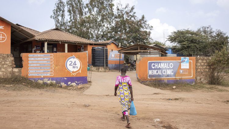 Woman heading into a clinic in Malindi, Kenya