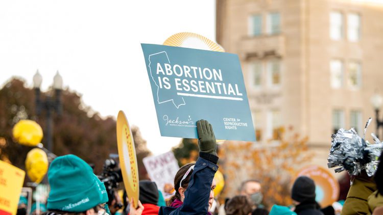 rally with abortion is essential sign