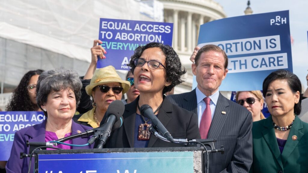 Woman speaking at podium